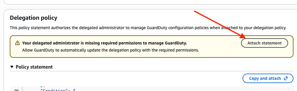 管理アカウントの GuardDuty 設定画面の Delegation policy セクション。Attach statement ボタンがある